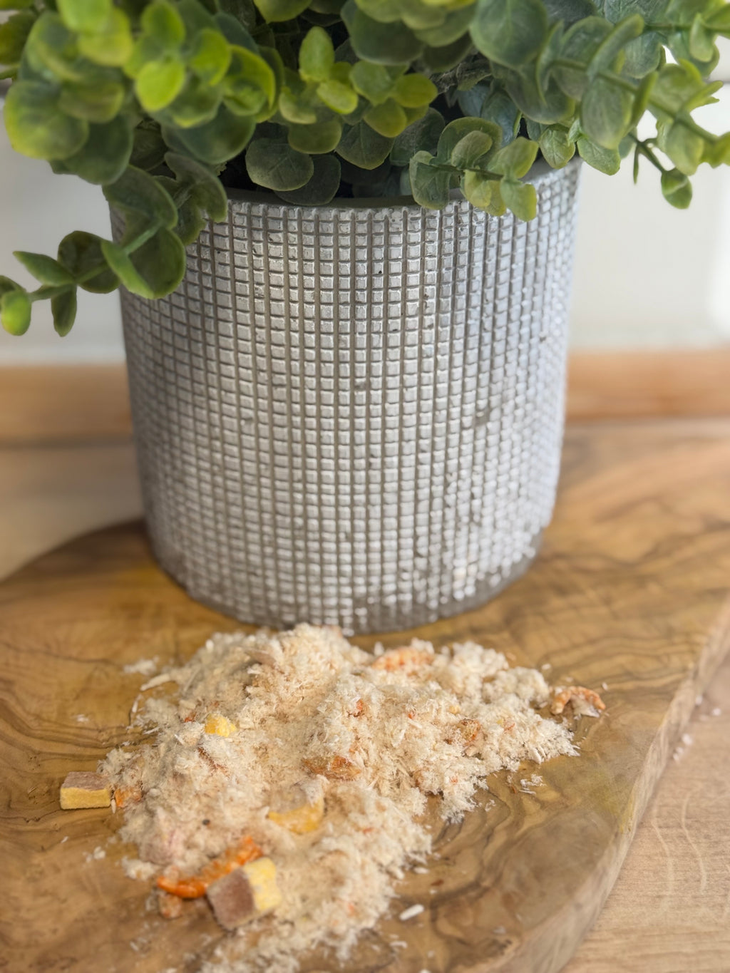 Freeze dried chicken shrimp and yolk topper.